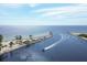 Aerial view of Venice Inlet and boat at 980 Cooper St # 302, Venice, FL 34285