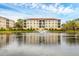 Building exterior showcasing a lakefront location at 980 Cooper St # 302, Venice, FL 34285