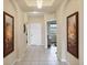 Tiled entryway with access to other rooms at 980 Cooper St # 302, Venice, FL 34285