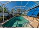 Screened pool and spa with covered patio at 10550 Old Grove Cir, Bradenton, FL 34212