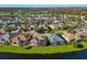 Aerial view showcasing home's location in a quiet neighborhood at 10550 Old Grove Cir, Bradenton, FL 34212