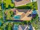 Bird's-eye view of the house and surrounding landscape at 10550 Old Grove Cir, Bradenton, FL 34212