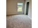 Bedroom featuring a window, neutral walls, closet and carpet flooring at 1157 Duquesne Rd., Venice, FL 34293