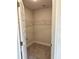 Walk-in closet with carpeted floor and wire shelving for optimal storage and organization at 1157 Duquesne Rd., Venice, FL 34293