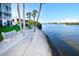 Relaxing waterfront walkway with benches, offering scenic views at 1350 N Portofino Dr # 302Tar, Sarasota, FL 34242