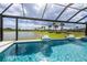 Inviting pool with water features, and a view of the lake at 16606 Barnwood Pl, Bradenton, FL 34211