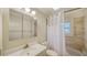 Clean and updated bathroom with a new vanity and shower/tub at 1920 Laurel St, Sarasota, FL 34236