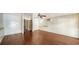 Bright bonus room with hardwood floors and built-in shelving at 1920 Laurel St, Sarasota, FL 34236