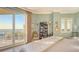 Ocean view bedroom with king-size bed and sliding glass doors to balcony at 2050 Benjamin Franklin Dr # B704, Sarasota, FL 34236