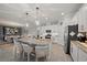 Spacious kitchen with granite countertops, stainless steel appliances, and an island at 2520 Avolet Ct, Bradenton, FL 34211