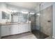 Elegant bathroom with double vanity, large shower, and modern fixtures at 2520 Avolet Ct, Bradenton, FL 34211