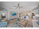 Spacious living room features comfortable seating, a large TV, and plenty of natural light at 2520 Avolet Ct, Bradenton, FL 34211