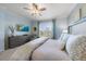 Main bedroom with king bed, TV, and tranquil water views at 2520 Avolet Ct, Bradenton, FL 34211