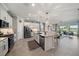 Modern kitchen with stainless steel appliances and island at 2520 Avolet Ct, Bradenton, FL 34211