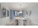 Elegant dining room with round table and modern chandelier at 2520 Avolet Ct, Bradenton, FL 34211