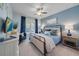 Spacious bedroom with a king-size bed and blue color scheme at 2520 Avolet Ct, Bradenton, FL 34211