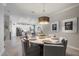 Open concept dining room with kitchen view at 2520 Avolet Ct, Bradenton, FL 34211
