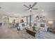 Bright and airy living room with comfortable seating and access to a patio at 2520 Avolet Ct, Bradenton, FL 34211