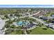 Aerial view of community amenities including pool, clubhouse, and pickleball court at 2520 Avolet Ct, Bradenton, FL 34211