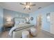 Serene main bedroom featuring a king-size bed and ensuite bathroom access at 2520 Avolet Ct, Bradenton, FL 34211