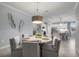 Open concept dining room with kitchen view at 2520 Avolet Ct, Bradenton, FL 34211