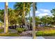The Crossings community entrance sign surrounded by lush greenery and palm trees at 2812 Heritage Ln # 2812, Bradenton, FL 34209