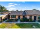 Lovely single-story home with a manicured lawn and walkway leading to the front door at 2812 Heritage Ln # 2812, Bradenton, FL 34209