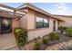 Charming exterior showcasing manicured landscaping, updated windows, and a warm, neutral color palette at 2812 Heritage Ln # 2812, Bradenton, FL 34209