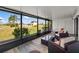 Screened lanai with outdoor seating, perfect for enjoying the peaceful backyard view at 2812 Heritage Ln # 2812, Bradenton, FL 34209