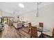 Bright living room with wood floors, modern furniture, and a large window with views at 2812 Heritage Ln # 2812, Bradenton, FL 34209