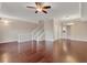 Living room with hardwood floors and access to dining area at 3309 10Th W Ln, Palmetto, FL 34221