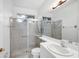 Clean bathroom with a glass-enclosed shower and modern sink at 455 Park Trace Blvd, Osprey, FL 34229