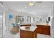 Bright, updated kitchen featuring stone countertops and stainless steel appliances at 455 Park Trace Blvd, Osprey, FL 34229
