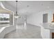 Open living space with lake views offering a blank canvas for your personal style at 455 Park Trace Blvd, Osprey, FL 34229