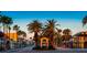 View of Venice Avenue featuring shops, restaurants, palm trees and blue skies at 455 Park Trace Blvd, Osprey, FL 34229