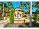 Community courtyard with a beautiful fountain at 5450 Bentgrass Dr # 5-203, Sarasota, FL 34235