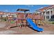 Fun playground for with a slide and climbing structures at 5450 Bentgrass Dr # 5-203, Sarasota, FL 34235