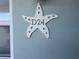 Unit number D24 displayed on a starfish-shaped sign at 611 Gulf N Dr # D24, Bradenton Beach, FL 34217