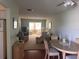View from entryway to living area and dining space at 611 Gulf N Dr # D24, Bradenton Beach, FL 34217