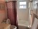 Clean bathroom with shower/tub combo, toilet and vanity at 611 Gulf N Dr # D24, Bradenton Beach, FL 34217