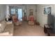 Living room with two comfy armchairs and a sofa at 611 Gulf N Dr # D24, Bradenton Beach, FL 34217