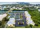 Community overview featuring tennis courts and water views at 619 Cedars Ct, Longboat Key, FL 34228