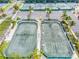 Aerial view of community tennis courts at 619 Cedars Ct, Longboat Key, FL 34228