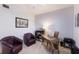 Bright home office features two leather chairs and a large desk at 6591 Fairway Gardens Dr # 2-102, Bradenton, FL 34203