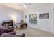 Cozy home office with hardwood desk and comfortable seating at 6591 Fairway Gardens Dr # 2-102, Bradenton, FL 34203
