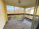 Enjoy the view from this screened porch with wood-look flooring at 6699 San Casa Dr # U2, Englewood, FL 34224