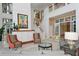 Spacious lobby featuring a grand staircase and ample natural light at 750 N Tamiami Trl # 302, Sarasota, FL 34236