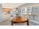 Bright kitchen with stainless steel appliances and light wood cabinets at 750 N Tamiami Trl # 302, Sarasota, FL 34236