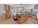 Modern kitchen with granite countertops and an island at 888 Blvd Of The Arts # 1701, Sarasota, FL 34236