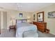 Guest bedroom with a queen bed and a dresser at 888 Blvd Of The Arts # 1701, Sarasota, FL 34236